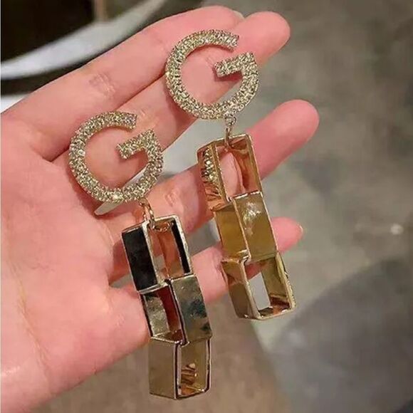 Designer-inspired G dangle cold tone earrings. Influencer 's pick. New. - Picture 4 of 6